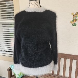 Luxurious Black Crew Neck Sweater with Soft Fuzzy Texture